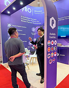 Team meeting visitors at the booth